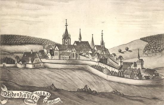 Eine Schwarz-Weiß-Zeichnung einer Stadt mit einem zentralen Schloss, umgeben von Häusern, Bäumen, Hügeln und Himmel, mit dem Text 'Bayerisch' unten.