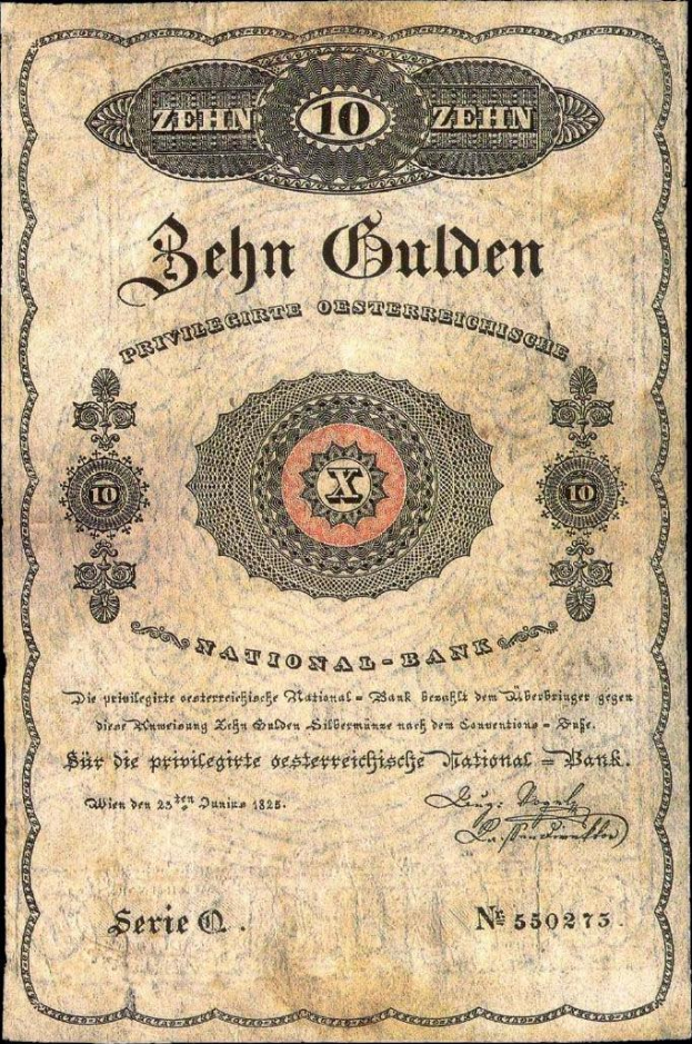 Eine alte deutsche Banknote mit schwarzem Hintergrund, die das Gesicht eines Mannes, den Text "Nationalbank von Deutschland" und ein Logo unten zeigt.