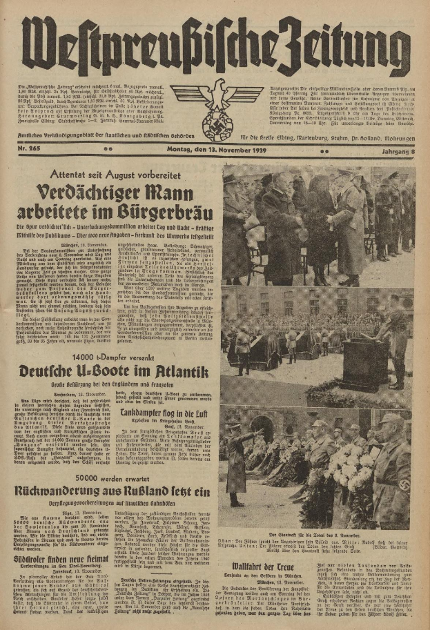 Schwarze-auf-Weiße-Titelseite einer deutschen Zeitung vom 13. November 1939 mit der Überschrift 'Weitpreubliche Zeitung', die eine Gruppe von Menschen in traditioneller deutscher Tracht in einer feierlichen Umgebung zeigt.