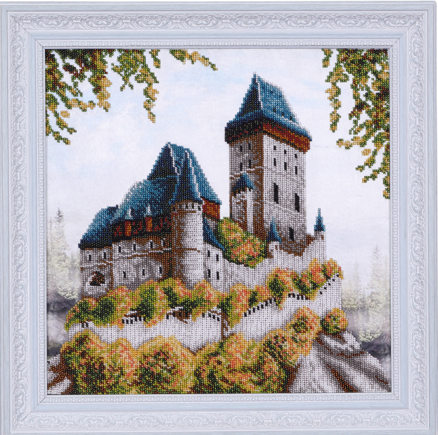 Ein hölzerner Bilderrahmen mit einem Haus.