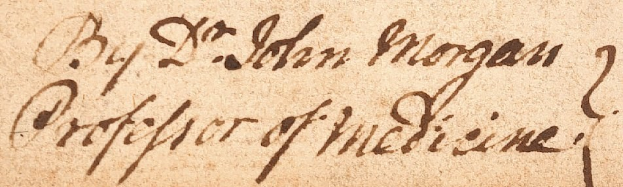 Nahaufnahme einer Rezeptkarte mit handgeschriebener Text in Schwarz auf einem Blatt Papier.