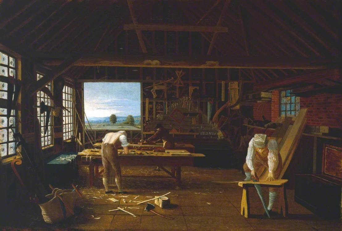 Gemälde namens "Die Schreinerwerkstatt" von William Hogarth, das zwei Männer bei der Arbeit in einer Werkstatt zeigt, mit einem Tisch voller Werkzeuge und anderen Gegenständen in der Mitte des Raumes, Fenstern auf der linken und rechten Seite und einem Hintergrund aus Bäumen, Bergen und Himmel.